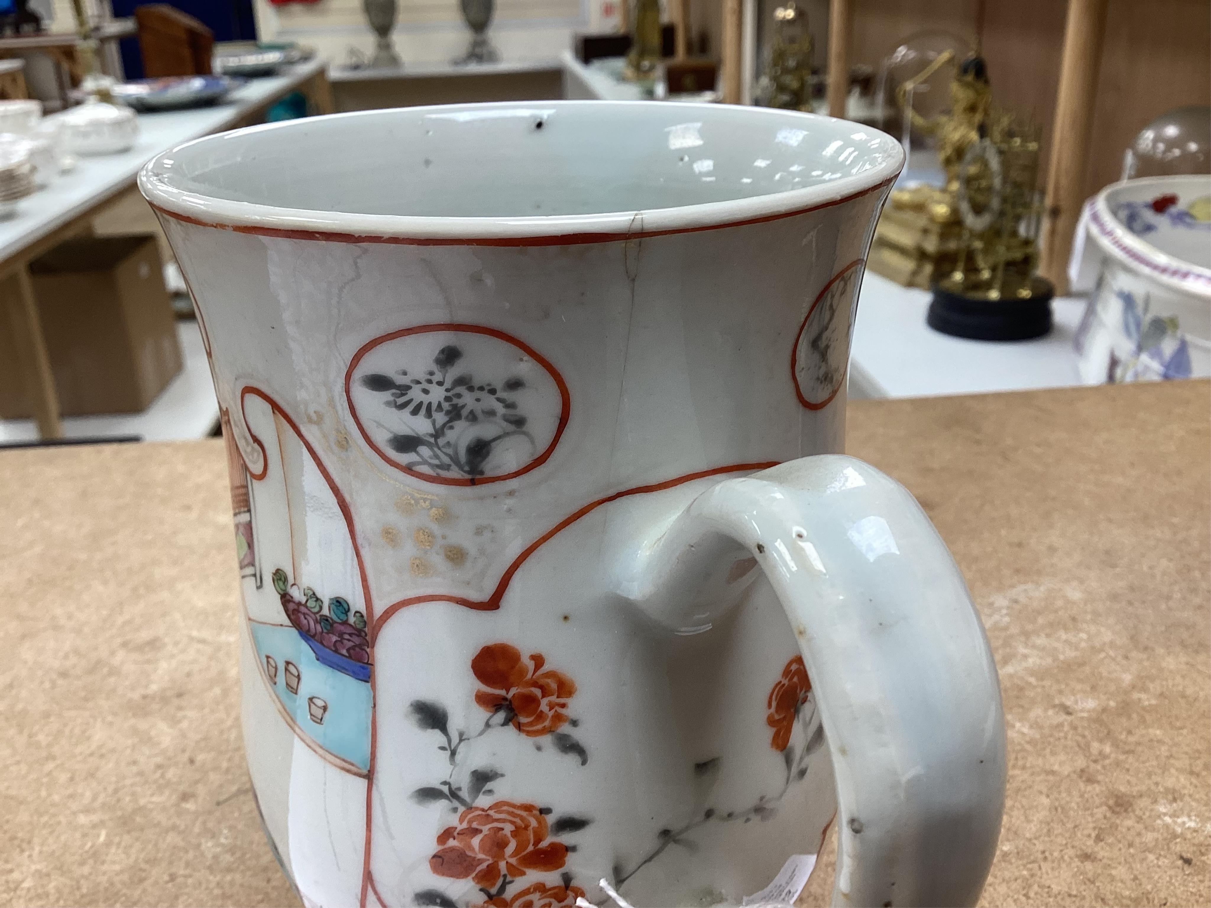 An 18th century Chinese export famille rose mug- 15cm high